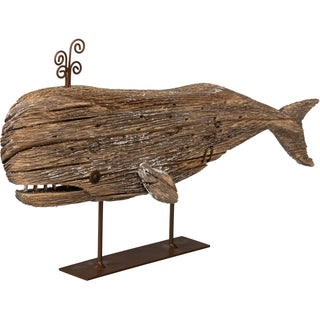 Large wooden whale on metal stand