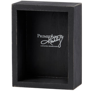 Being A Functional Adult box sign styled on a shelf