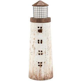 Large rustic white wooden lighthouse styled on a shelf