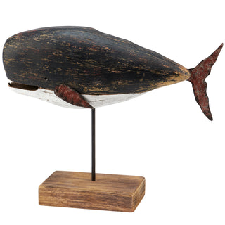Black wooden whale on stand styled