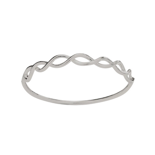 Silver ring with a wavy twisted top on a white background