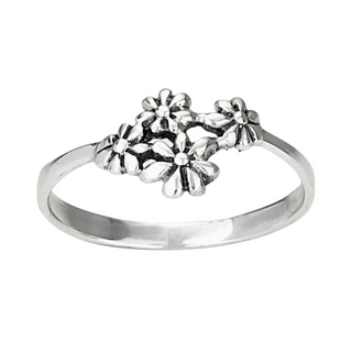 Silver ring with floral design on a white background