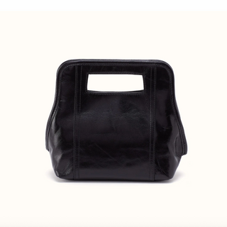 A black leather handbag with a rectangular top handle cutout, photographed against a clean off-white background.