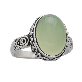 ring with smooth light green stone and decorative silver setting