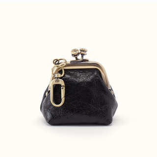 A small black leather kiss-lock coin purse with gold-tone metal hardware, including a clasp and key ring, shown on a clean white background.