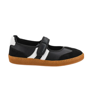 A black suede and leather Mary Jane shoe with a hook-and-loop strap closure and a brown gum sole, shown from a side profile on a white background.