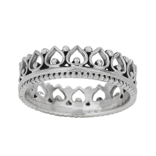 Silver crown-style ring on a white background