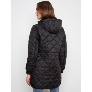 A woman viewed from the back wearing a black quilted hooded puffer jacket against a plain light gray studio background.