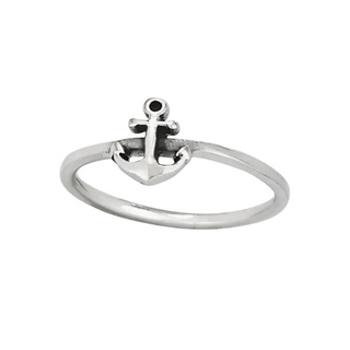 Silver ring with an anchor design on a white background